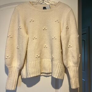 Elegant Cream Sweater with Textured Details